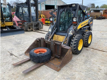 New Holland L 160  - Gumikerekes homlokrakodó: 1 kép.