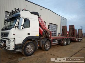 Platós teherautó a következők szállításához nehézgépek 2011 Volvo FM500: 1 kép.