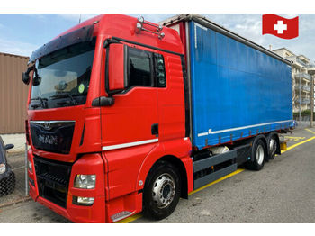 Ponyvás teherautó MAN TGX 26.480