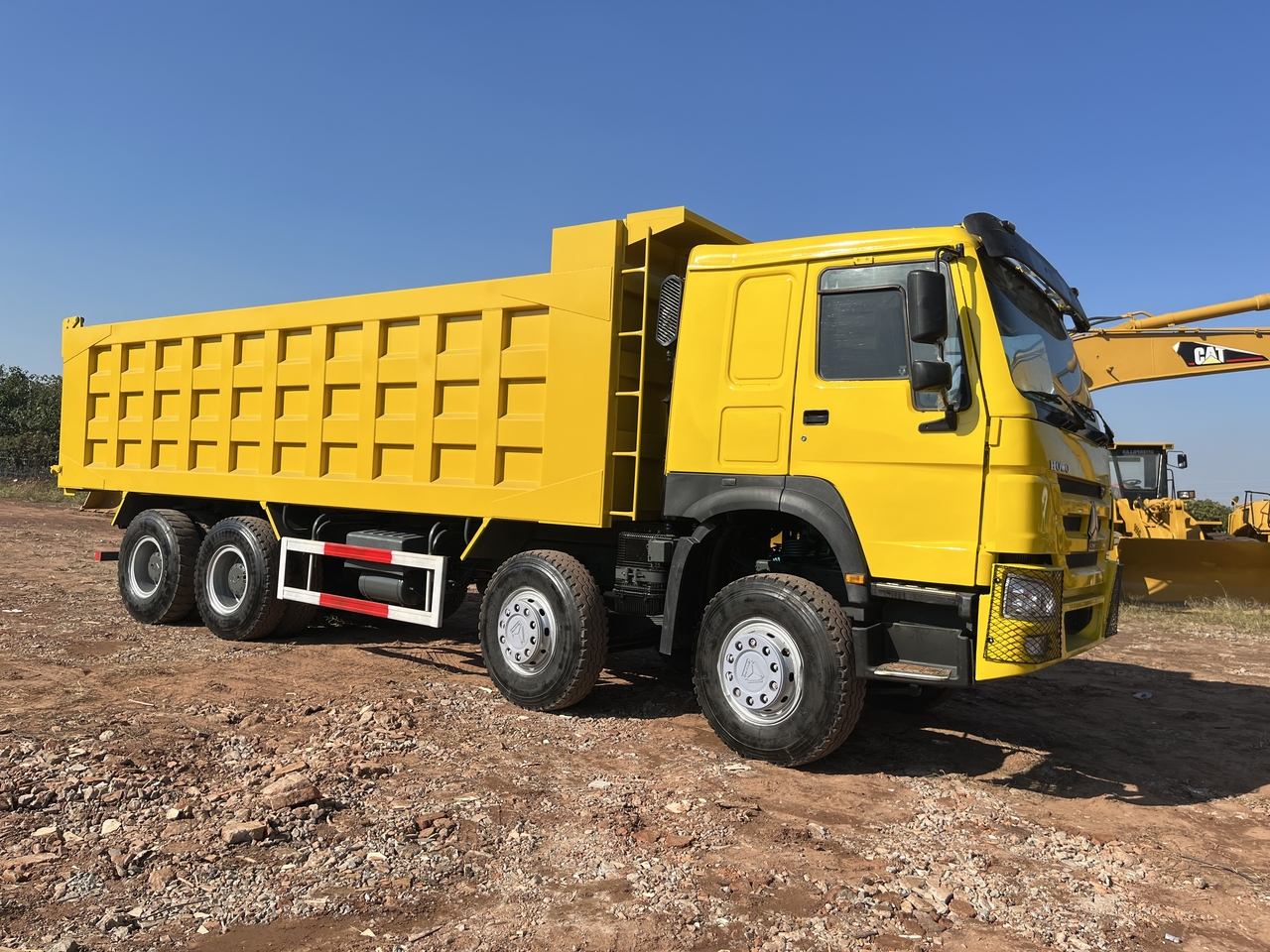 Billenőplatós teherautó a következők szállításához silózás SINOTRUK HOWO 371 Dump Truck 8x4: 5 kép.