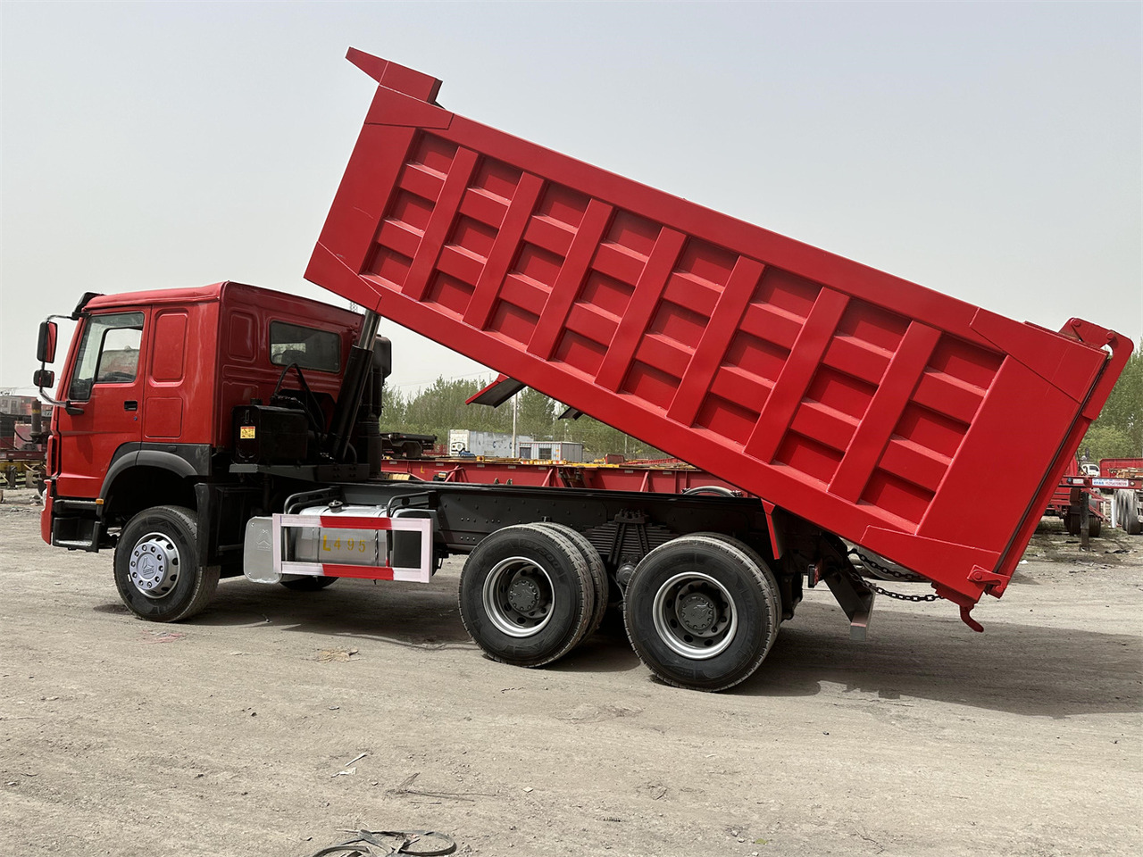 Billenőplatós teherautó a következők szállításához silózás SINOTRUK Howo Dump truck 371: 11 kép.