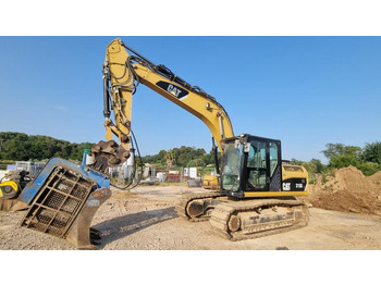 Lánctalpas kotró Caterpillar 315DL: 3 kép.