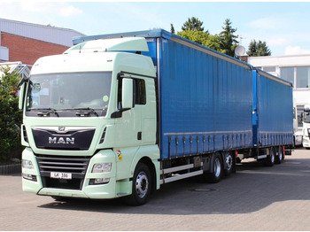 Ponyvás teherautó MAN TGX 26.460