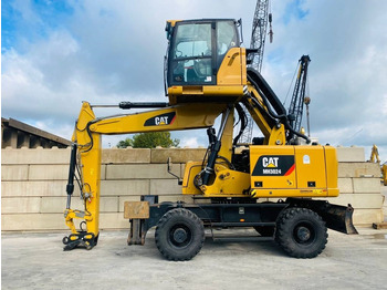 Hulladék kotró CATERPILLAR MH3024