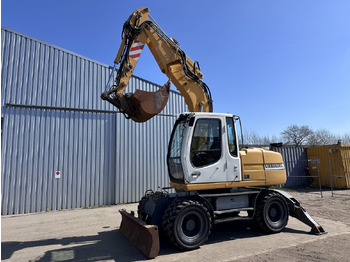 Gumikerekes kotró LIEBHERR A 314