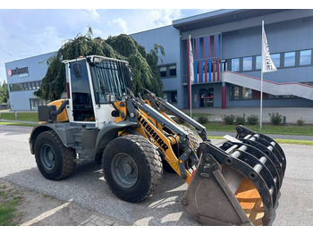 Gumikerekes homlokrakodó Liebherr L 514 Stereo +30 Kmh Klima 3er Kreis Greifschaufel: 4 kép.