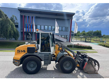 Gumikerekes homlokrakodó Liebherr L 514 Stereo +30 Kmh Klima 3er Kreis Greifschaufel: 2 kép.