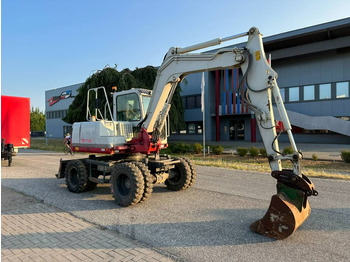 Gumikerekes kotró Takeuchi TB 175 W 8,7 ton. Klima Turbo 77 PS: 4 kép.