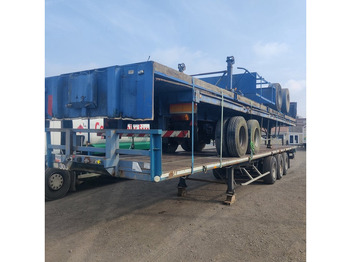 Platós félpótkocsi TRAILOR