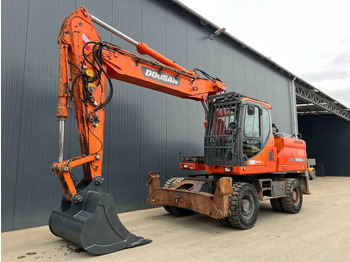 Gumikerekes kotró DOOSAN DX210