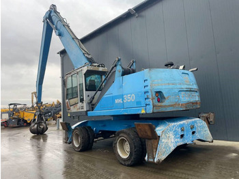 Hulladék kotró a következők szállításához hulladék Fuchs MHL350: 3 kép.