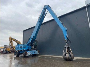 Hulladék kotró a következők szállításához hulladék Fuchs MHL350: 4 kép.