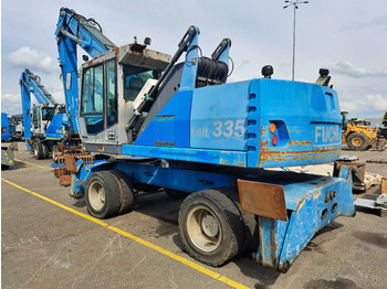 Hulladék kotró a következők szállításához hulladék Fuchs MHL 335: 4 kép. Hulladék kotró a következők szállításához hulladék Fuchs MHL 335: 4 kép.