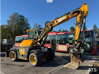 Gumikerekes kotró JCB