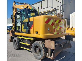 Gumikerekes kotró CAT M314F: 4 kép.