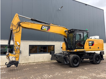 Gumikerekes kotró CATERPILLAR M322