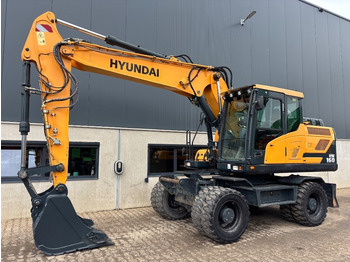 Gumikerekes kotró HYUNDAI