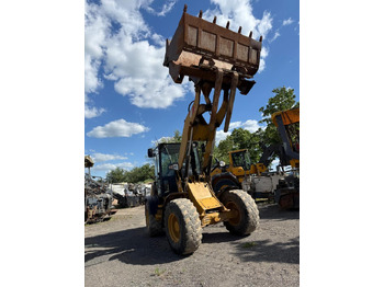 Gumikerekes homlokrakodó Caterpillar 908 H 2 mal verfügbar: 2 kép.