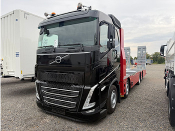 Autószállító teherautó Volvo Arbeitsbühnen Baumaschinentransporter mit Rampen: 2 kép.