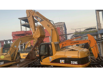 Kétéltű kotrógép CATERPILLAR 320C: 4 kép. Kétéltű kotrógép CATERPILLAR 320C: 4 kép.