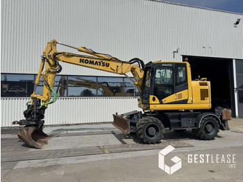 Gumikerekes kotró KOMATSU PW148-11