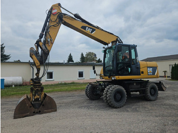 Gumikerekes kotró CATERPILLAR M315D
