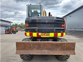 Gumikerekes kotró New Holland MYYTY! SOLD! MH2.6 ENGCON PIHDEILLÄ: 3 kép.