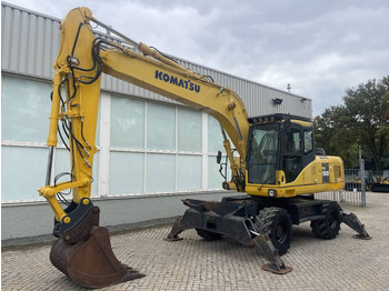 Gumikerekes kotró KOMATSU PW180