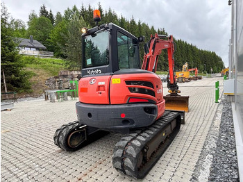 Minikotró Kubota U 55-4: 4 kép.