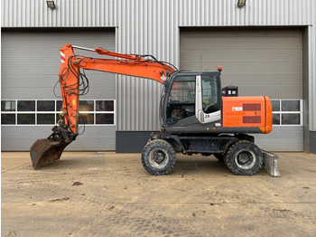 Gumikerekes kotró HITACHI ZX140W-3
