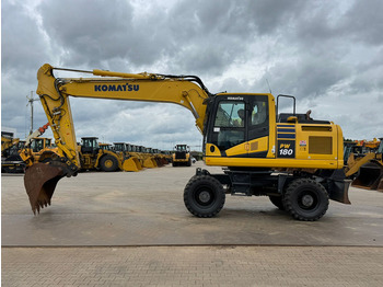 Gumikerekes kotró KOMATSU PW180