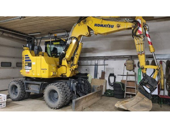 Gumikerekes kotró KOMATSU