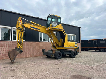 Gumikerekes kotró Komatsu PW200: 5 kép.