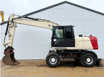 Gumikerekes kotró CATERPILLAR M316D