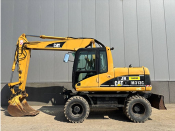 Gumikerekes kotró CATERPILLAR M313C