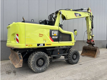 Gumikerekes kotró CAT M 320 F: 5 kép. Gumikerekes kotró CAT M 320 F: 5 kép.