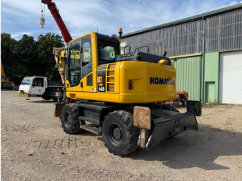 Gumikerekes kotró Komatsu PW 148-8: 4 kép.