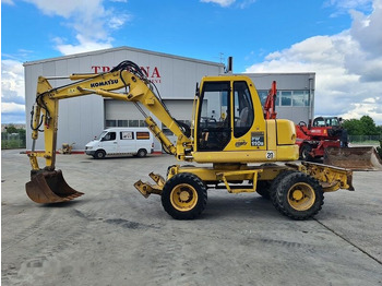 Gumikerekes kotró KOMATSU
