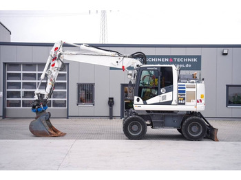 Gumikerekes kotró KOMATSU PW148-11