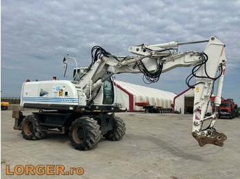 Gumikerekes kotró HITACHI ZX140W-3