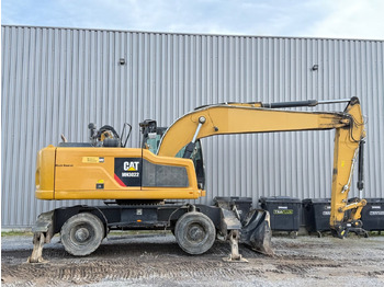 Gumikerekes kotró CATERPILLAR MH3022