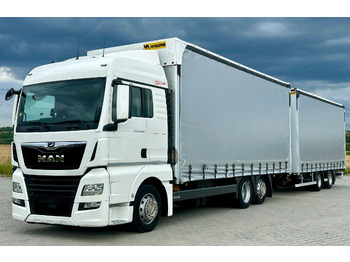 Ponyvás teherautó MAN TGX 26.460
