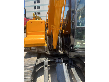 Minikotró Hyundai R80-7: 3 kép. Minikotró Hyundai R80-7: 3 kép.