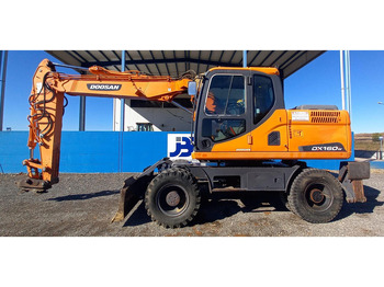 Gumikerekes kotró DOOSAN DX140W-3