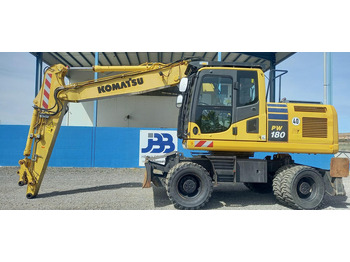 Gumikerekes kotró KOMATSU PW180
