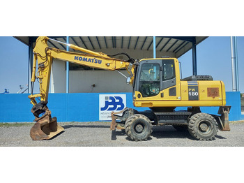 Gumikerekes kotró KOMATSU PW180