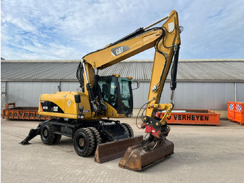 Gumikerekes kotró CATERPILLAR M318D