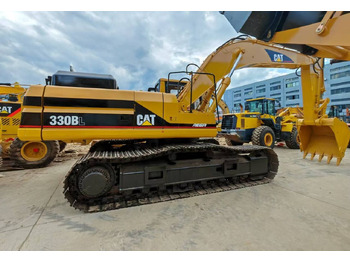 Lánctalpas kotró Caterpillar 330BL: 3 kép.