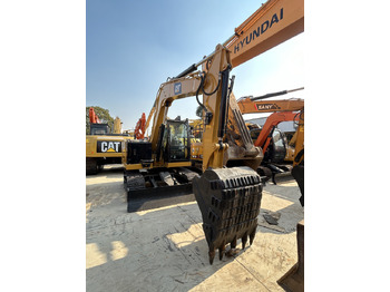 Minikotró CAT 307.5 Excavator: 5 kép. Minikotró CAT 307.5 Excavator: 5 kép.