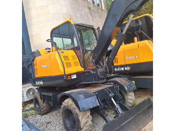 Gumikerekes kotró Hyundai 60vs excavator: 4 kép. Gumikerekes kotró Hyundai 60vs excavator: 4 kép.